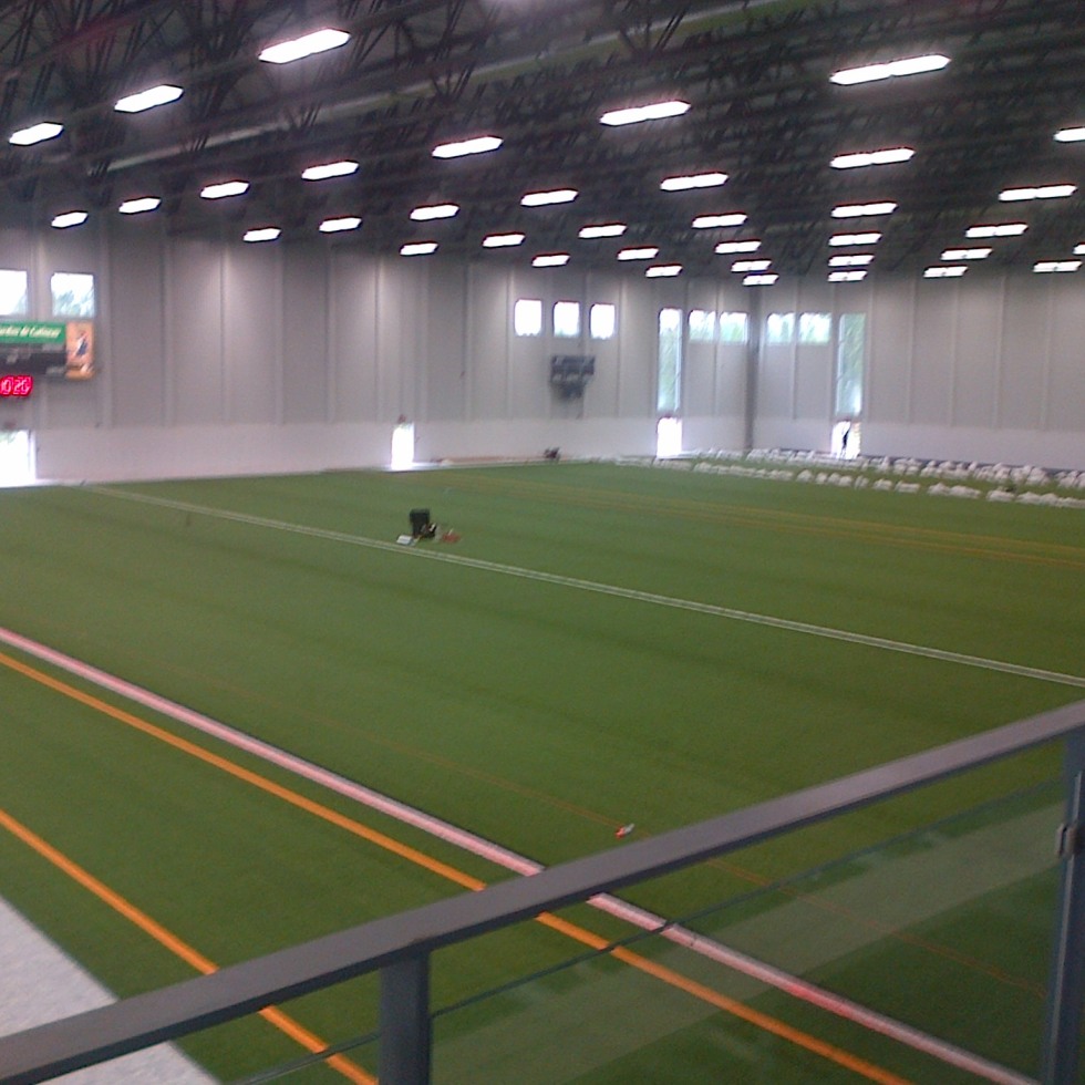 The soccer turf getting installed at Complexe Branchaud Briere